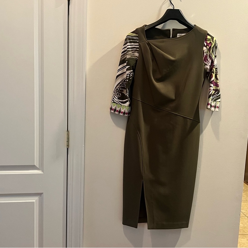 New!
Calvin Klein Three-Quarter Sleeve Crepe Sheath
Dress with slit